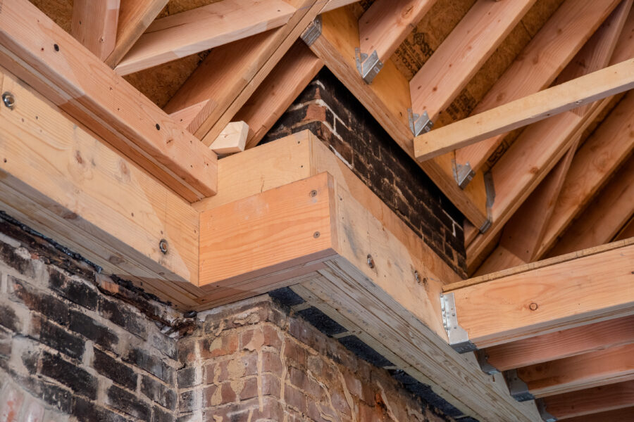 Wooden bond beams were installed in the Schifferdecker home along the top of the brick walls to stabilize the structure
