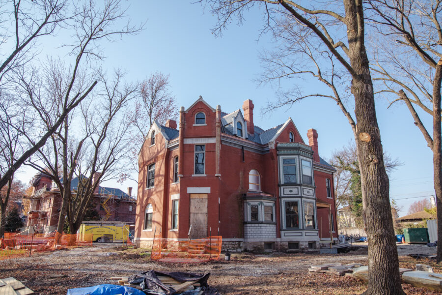 The Zelleken Queen Anne style home under renovation with wrap-around porch removed.