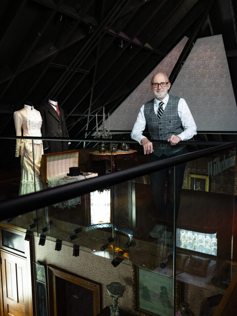 Brad Belk posing at the railing of the observation deck