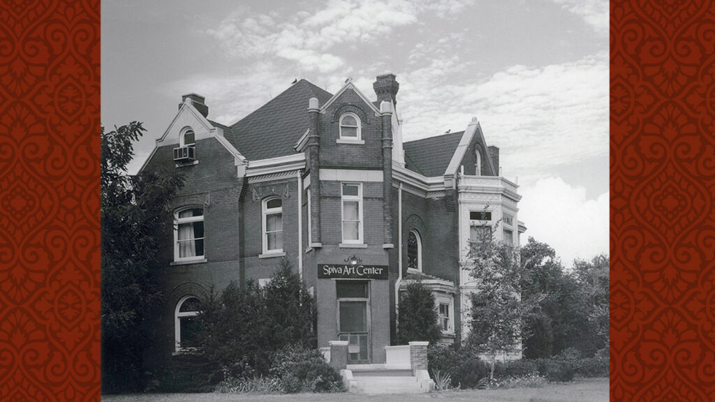 Vintage photo of Zelleken home around 1960 with the "Spiva Art Center" sign over the front door